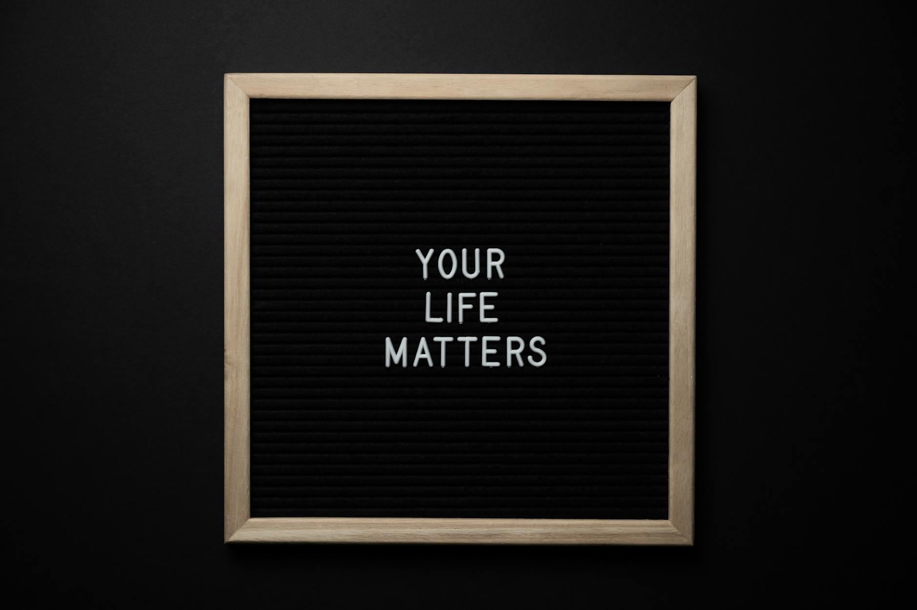 blackboard with your life matters inscription on black background